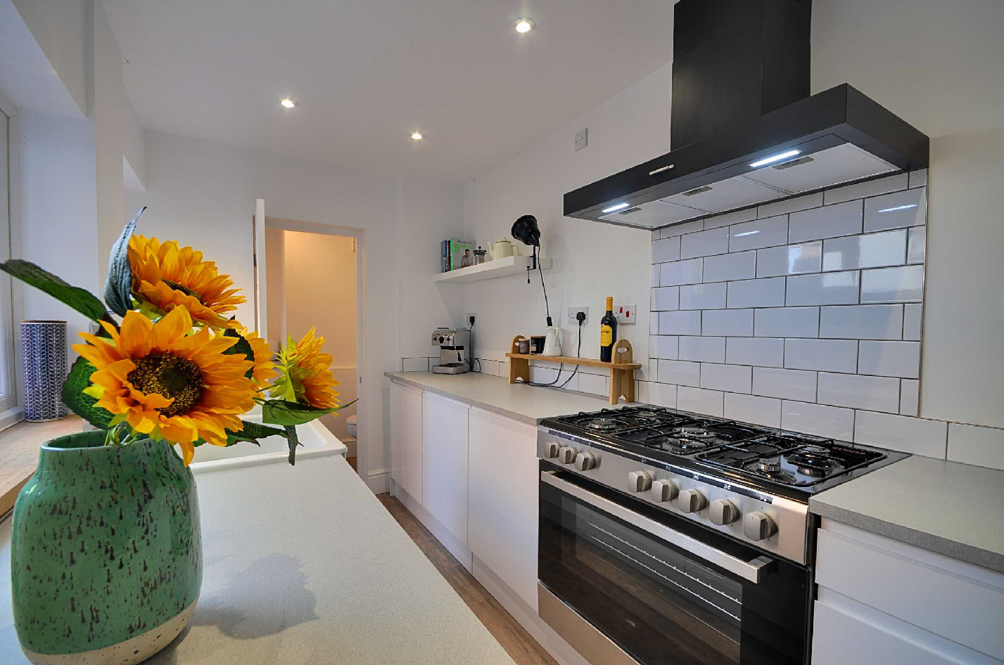 A well dressed kitchen in a property for sale